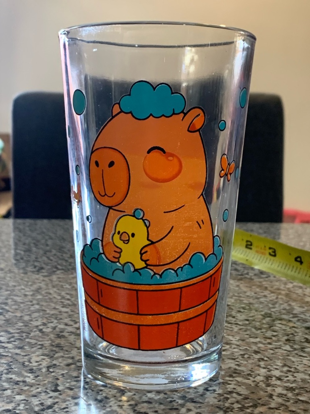 Cute Capybara Bathing with Rubber Duckie Glass with Blue Accents